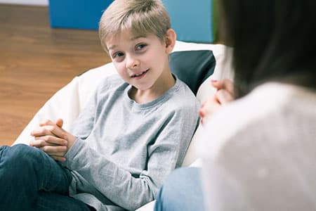 Child Talking with Psychologist About ADHD Screening near Novi MI