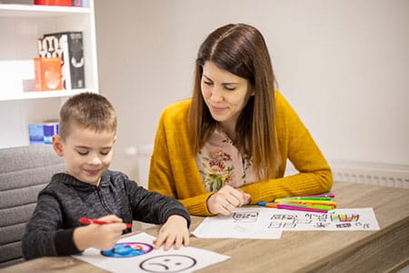 Woman and Child Performing Dyslexia Testing in Ann Arbor MI