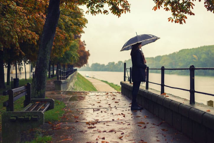 Woman Holding Umbrella