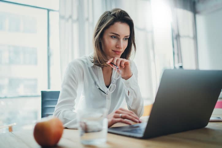 Woman Looking At Laptop