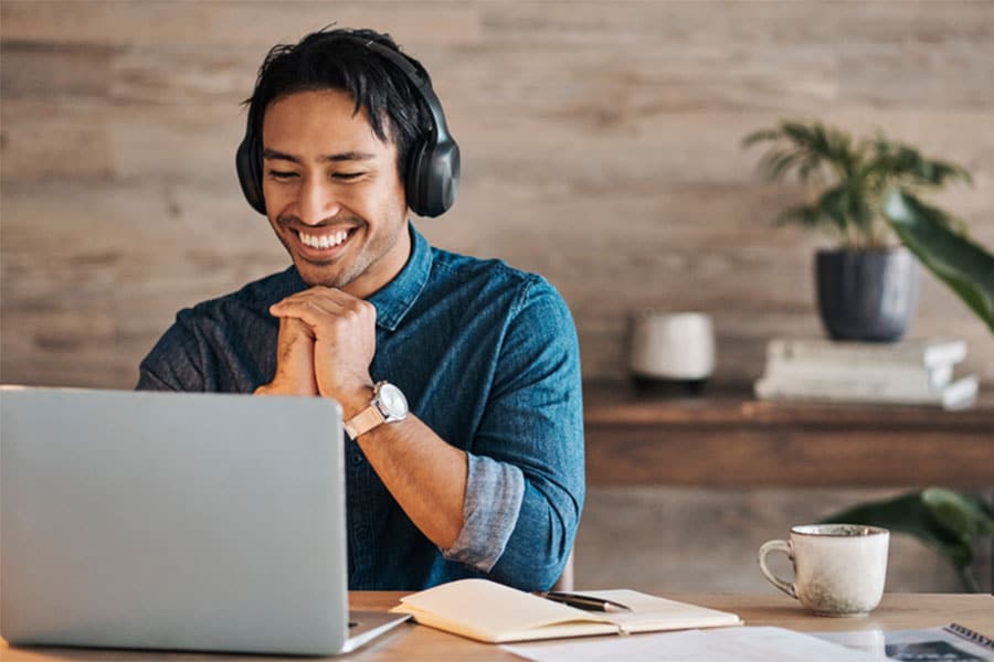 Man With Laptop and headphones