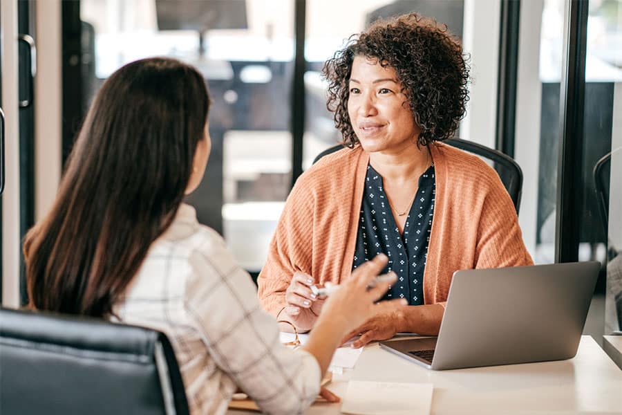 Woman Talking with Boss